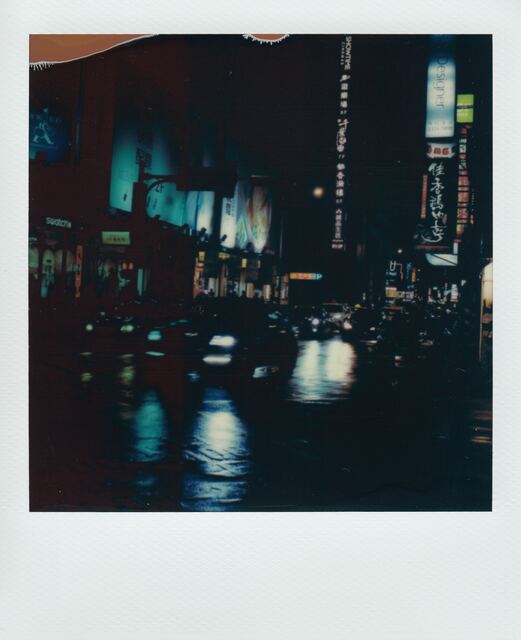 polaroid: ximending neon and wet asphalt at night